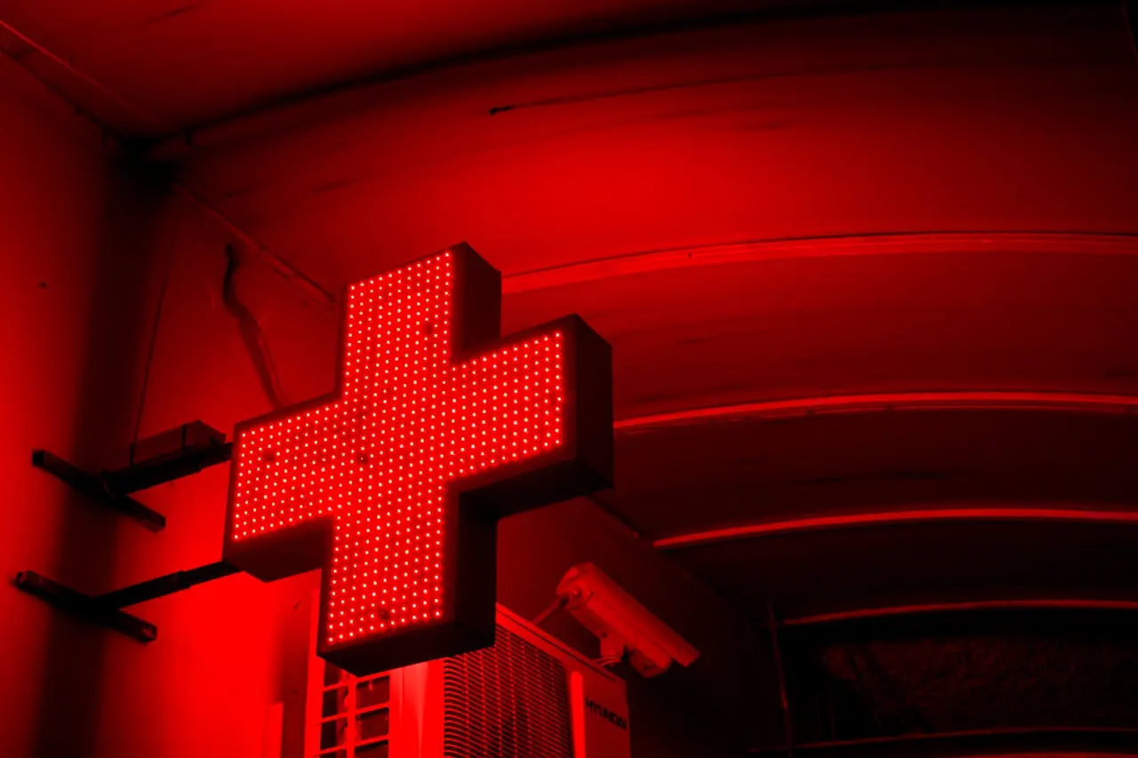 a pharma cross, and a surveillance camera, and an artificial air conditioner, all in a red tone